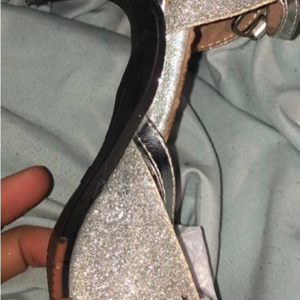 Cute silver heels with stars has been worn